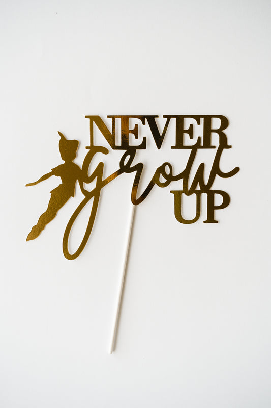 Never grow up cake topper